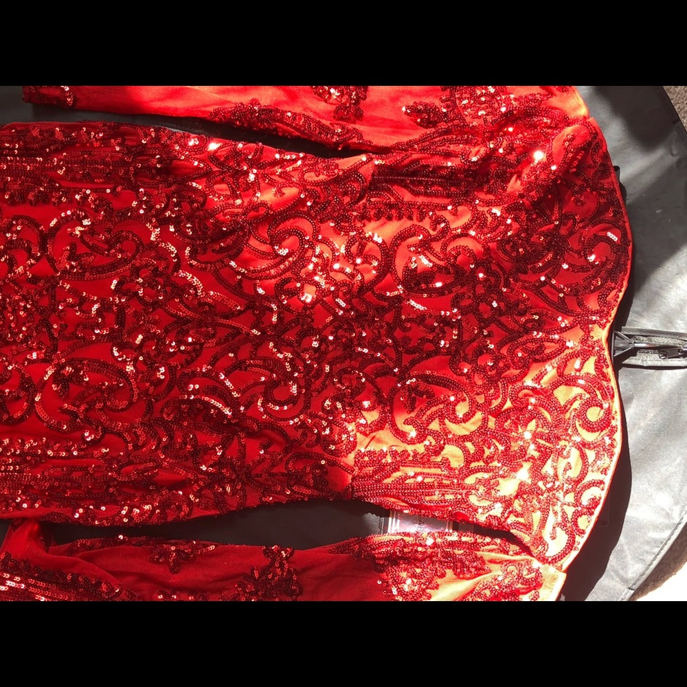 Red sequined prom dress.
